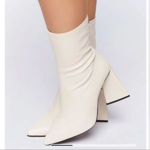 White heeled boots